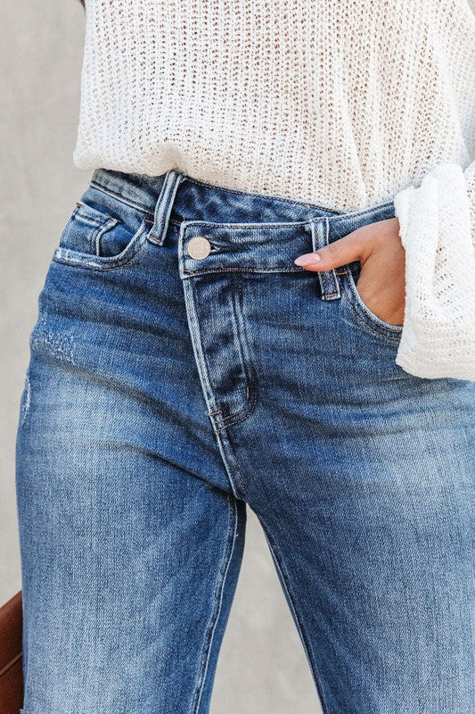 Asymmetrical cross over jean