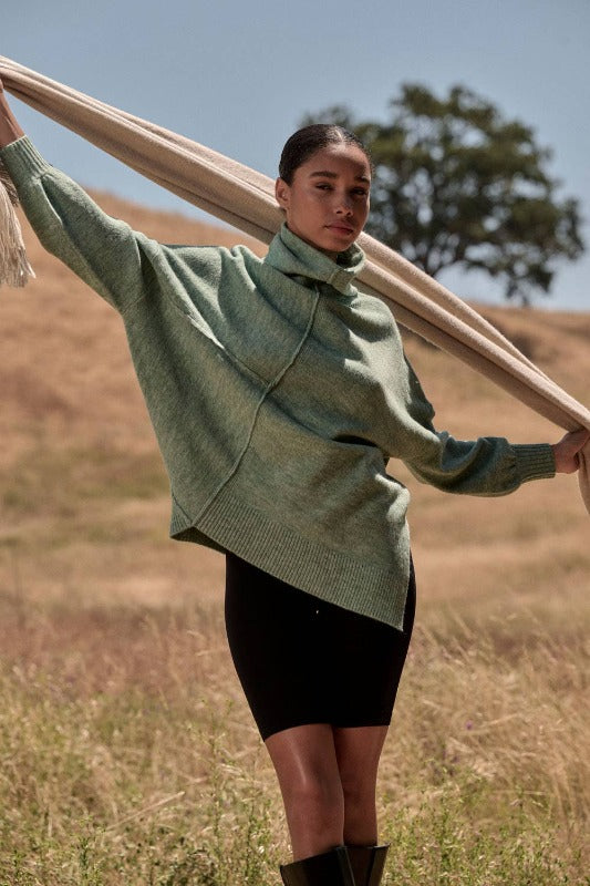 Heathered Exposed Seam Turtleneck Sweater